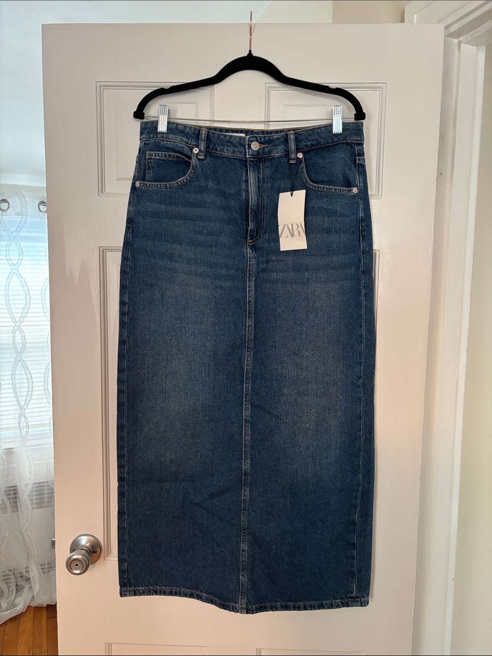 **Brand new w/tags. ZARA Sz L; Blue Denim Skirt, back slit
